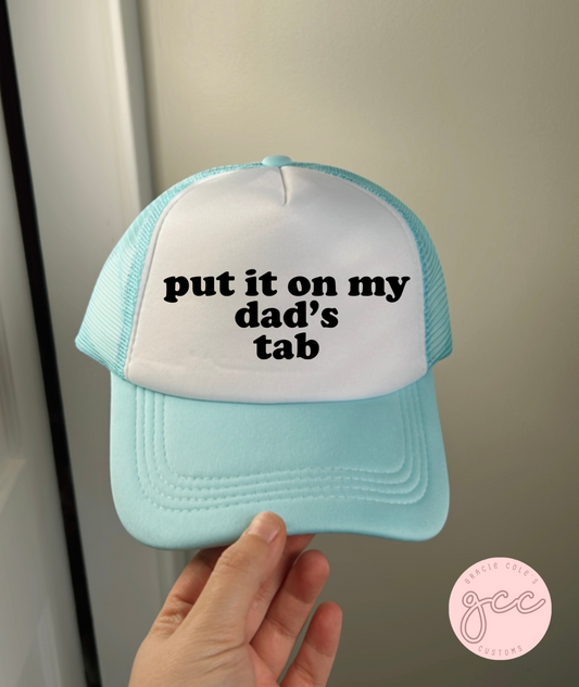 Put It On My Dad's Tab Trucker Hat