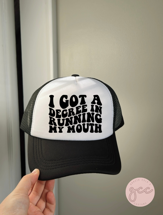I Got A Degree In Running My Mouth Trucker Hat